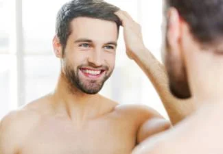 Surgeon implanting individual grafts